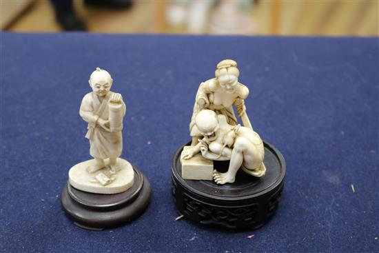 A good Japanese ivory okimono of the Rat Catcher and a figure of a man, both Meiji period